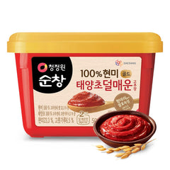 Chung Jung One gochujang mild jar close-up for authentic Korean flavor and versatility.