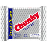 Chunky Giant Milk Chocolate Bar unwrapped, peanuts and raisins visible for flavor