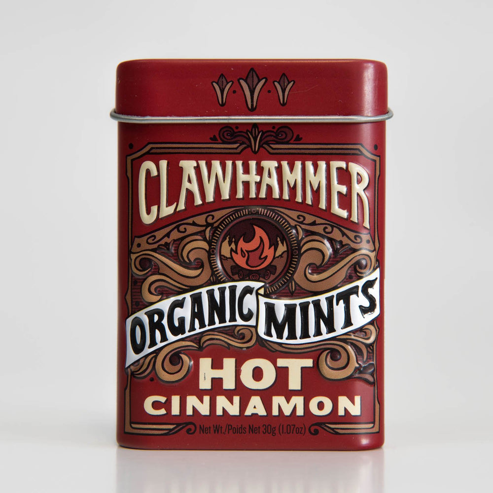 Clawhammer Organic Mints hot cinnamon tin close-up showing organic flavor and convenient packaging.