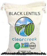 CLEAR CREEK Black Lentils packaging highlights non-GMO quality for versatile meals.