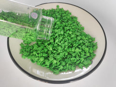 Clonynix green grass sprinkles on cookies add festive color.