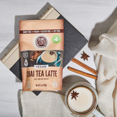Coconut Cloud chai latte powder scoop highlights simple, clean ingredients.