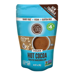 Coconut Cloud hot cocoa packaging beside a mug for a creamy, dairy-free treat.