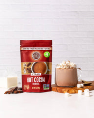 Coconut Cloud prepared hot cocoa cup on table for quick comfort.