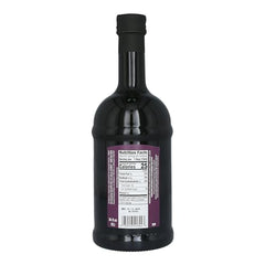 Colavita balsamic label closeup shows IGP seal and rich color.