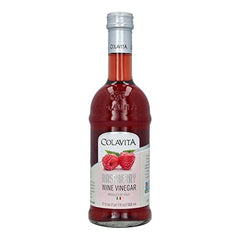 Side view of Colavita Raspberry Red Wine Vinegar bottle in kitchen