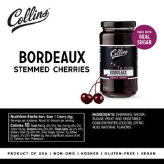 Collins Chicago stemmed Bordeaux cherries on rim of a cocktail, stylish presentation.