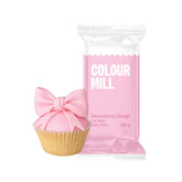 Colour Mill Decorators Dough baby pink roll shows smooth fondant preparation for cakes.