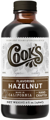COOK'S Pure Hazelnut Flavor bottle enhances baking with rich, buttery notes.