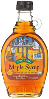 Coombs Family Farms Organic Grade B maple syrup in a glass bottle ready to drizzle.
