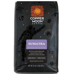 Copper Moon Sumatra Dark Roast beans in bag, rich aroma and bold flavor for home brewing