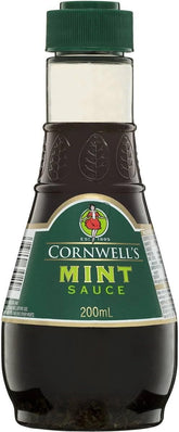 Cornwells Mint Sauce bottle being poured over lamb for a savory mint glaze.