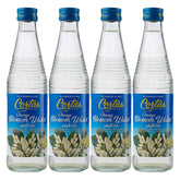 Cortas orange blossom water bottle pouring into a drink for floral citrus aroma