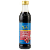 Cortas Pomegranate Molasses No Sugar Added poured over salad for vibrant flavor