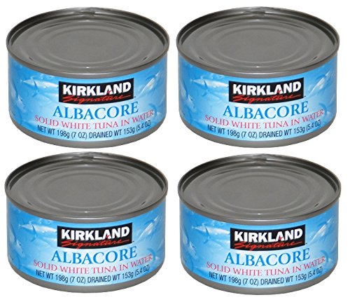 Kirkland albacore tuna in water four-pack on shelf, a pantry-ready protein option.