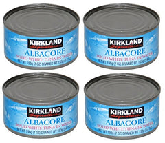 Kirkland albacore tuna in water four-pack on shelf, a pantry-ready protein option.