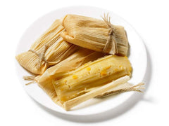Country Creek Acres tamales with corn masa filling wrapped in husks