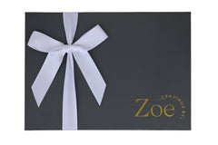 CRAVINGS BY ZOE dark chocolate Oreo with white toppings, rich taste.
