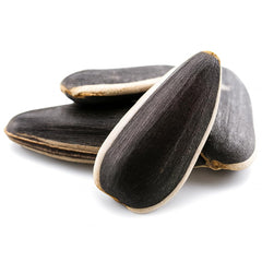 Crazy Nuts raw sunflower seeds in shell close-up, ideal for snacking.