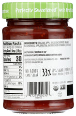 Crofters Organic Raspberry Fruit Spread pour shows glossy drizzle perfect for toast or yogurt.