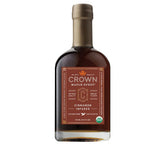 Crown Maple Cinnamon Infused Maple Syrup bottle adds warm cinnamon to pancakes.