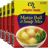 Croyden House matzo ball soup served in a bowl, ready for a comforting meal