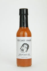 Cry Baby Craig's habanero garlic hot sauce bottle pour adds bright heat to dishes
