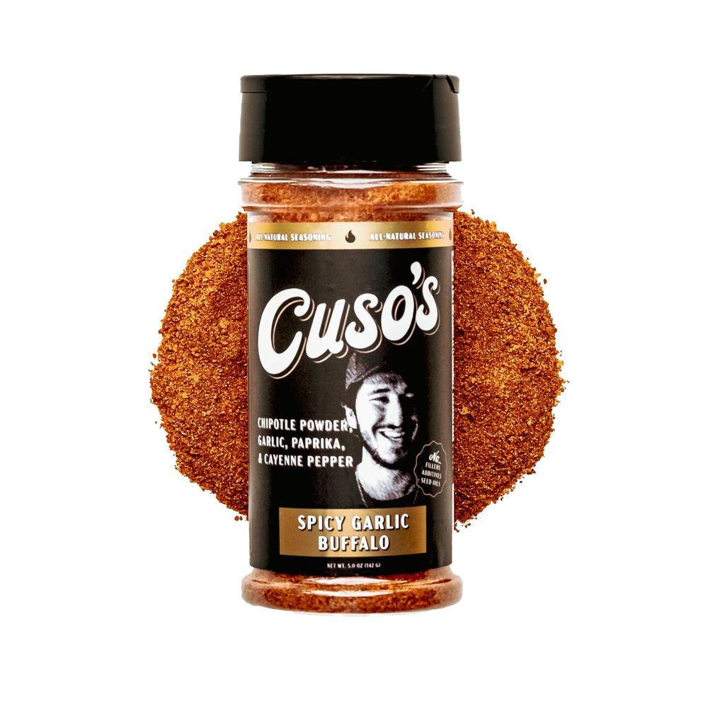 Cuso's Cuts Spicy Garlic Buffalo Rub bottle on counter for bold grilling