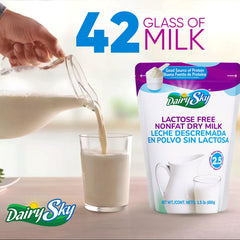 DairySky lactose-free milk powder measured with a spoon for drinks.