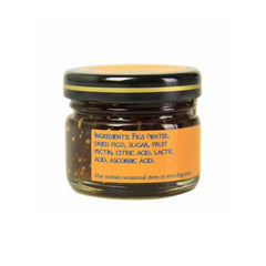 Dalmatia Mini Fig Spread on spoon shows thick texture for snacking