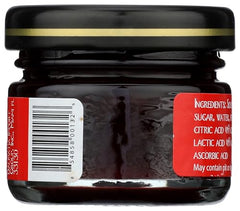 Dalmatia Spread Sr Chry Mini Jar spoon-scoop closeup emphasizes smooth, rich texture.