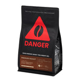 Danger Coffee remineralized beans in a bag showing mineral-rich brew potential
