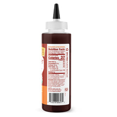 Date Lady BBQ Sauce bottle pouring with rich smoky glaze