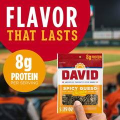 Hand holding DAVID seeds for on-the-go snacking.