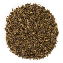 Davidson's Decaf Green tea cup steeping for a light, nutty flavor
