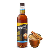 DaVinci Gourmet Sugar-Free Butter Rum Syrup bottle on counter, sugar-free flavor for drinks.