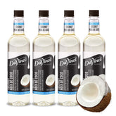 DaVinci Gourmet Sugar Free Coconut Syrup bottle on counter for tropical coffee flavor.