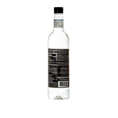 DaVinci Gourmet Sugar Free Coconut Syrup in a coffee cup adds creamy coconut flavor without sugar.