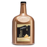 DaVinci Gourmet White Chocolate Sauce bottle pour showcases velvety creaminess ideal for beverages.