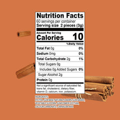 Close-up of DC24 Daily Care xylitol gum pieces with cinnamon flavor.