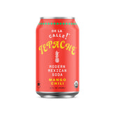 De La Calle Organic Mango Chili Tepache bottle on a bright table, refreshing and tangy.