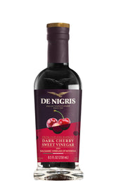 De Nigris dark cherry sweet vinegar bottle showcasing rich fruit flavor for glaze and drizzle.