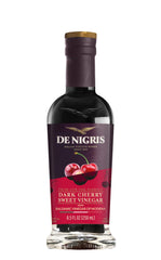 De Nigris dark cherry sweet vinegar bottle showcasing rich fruit flavor for glaze and drizzle.
