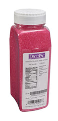 Close-up of pink DecoPac sanding sugar crystals ready to top cupcakes