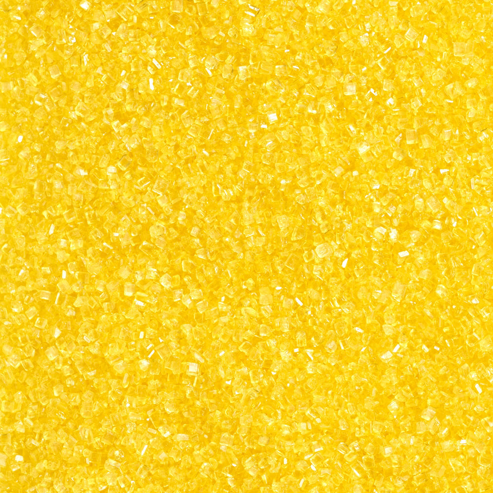 DecoPac yellow sanding sugar in handheld container for quick decorating.