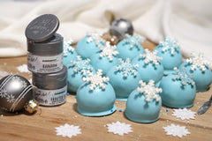 DiamonDust edible glitter on chocolates creates a refined purple sheen.