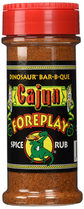 Dinosaur Bar-B-Que Cajun Foreplay dry spice rub label on jar for bold grilled flavor.