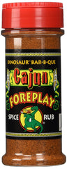 Dinosaur Bar-B-Que Cajun Foreplay dry spice rub label on jar for bold grilled flavor.