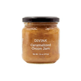 Divina caramelized onion jam jar on a cheese board enhances appetizers.