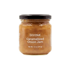 Divina caramelized onion jam jar on a cheese board enhances appetizers.